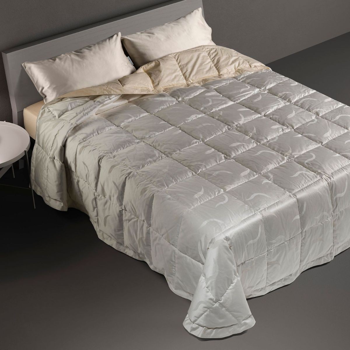 Piumone grigio top